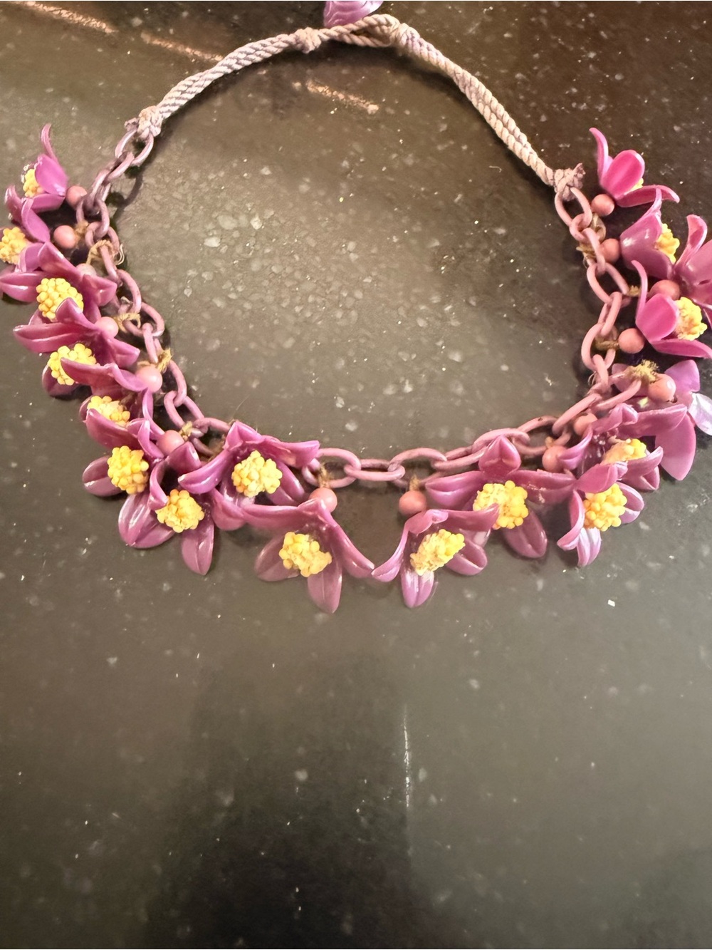 Rare Antique celluloid 1940s purple flowers on cord  necklace
